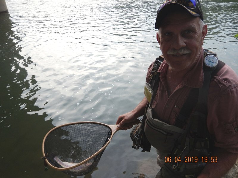 $BaldEagleStatePark2005$.jpg - Mike with one of many he caught but, hey, he should catch a few more...this is his home water and he fishes italmost every day.  Yours truly is still learing...but I'm catching up fast.