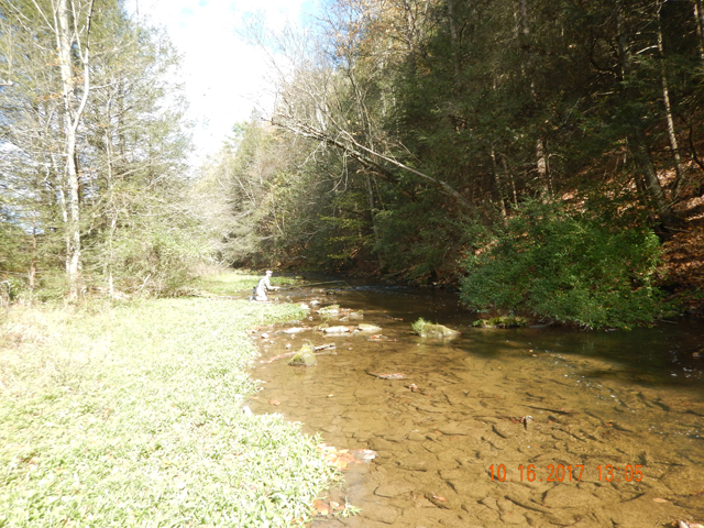 DSCN2705.jpg -                                Next day it was up to Elk Creek.  We saw some fish here but didn't bring any to the net.  As we were leaving we saw this part of the stream is posted against trespassing.  Guess we won't be back this way any time soon.