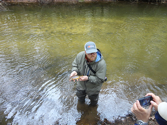 DSC01458.jpg - Neil with his catch.                               