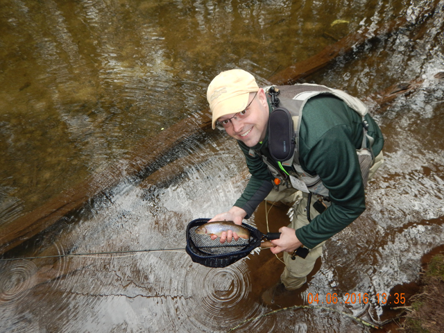 DSCN1014.jpg -                              Here's another he got.  All brookies but not nearly as pretty as the wild ones.  