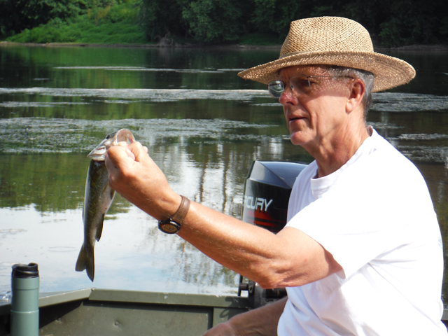 DSCF9473.jpg - The sun got a bit hotter so I switched hats...the fish didn't seem to mind.