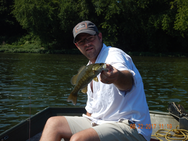 DSCN2345.jpg -                                In spite of the hot weaterh (over 90 degrees) we still caught a few fish.