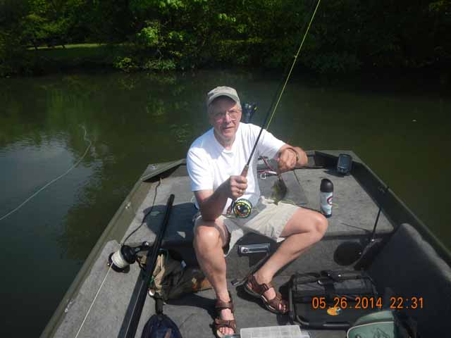 DSCN1001.jpg -                                Fly rodding for pan fish.  Its a hoot.