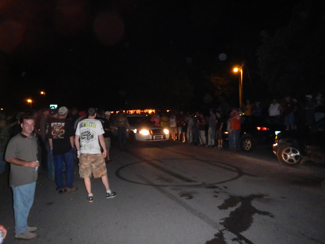 DSCN0248.jpg -                                The drove through the crowd and left.  Smart move.  Check the circle burn out in front of the cop car.  A motorcycle did that moments before.