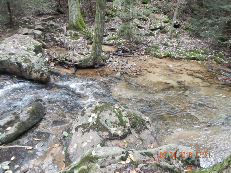 $Stone Cabin011$.jpg - This hole is deeper than it looks.