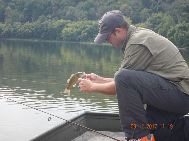 DSCN2575.jpg -                                Here's another one he got.  I was throwing fly line all day and it took me a while to catch on.