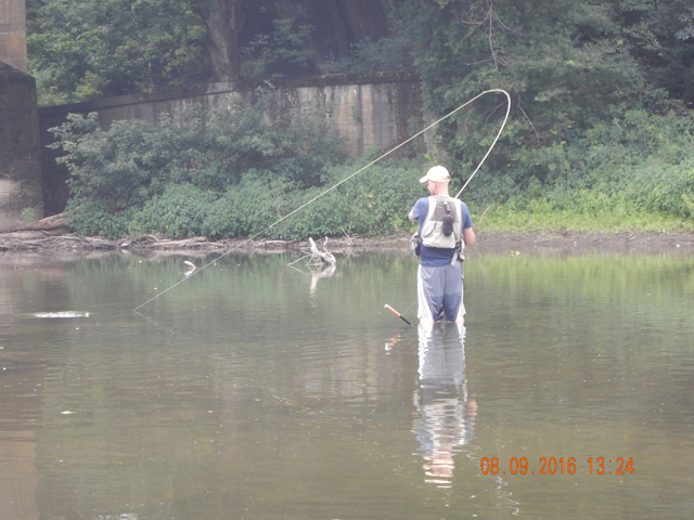 DSCN1604.jpg -                                Gary hooked a nice fish.  Not really big but it put up a good fight.